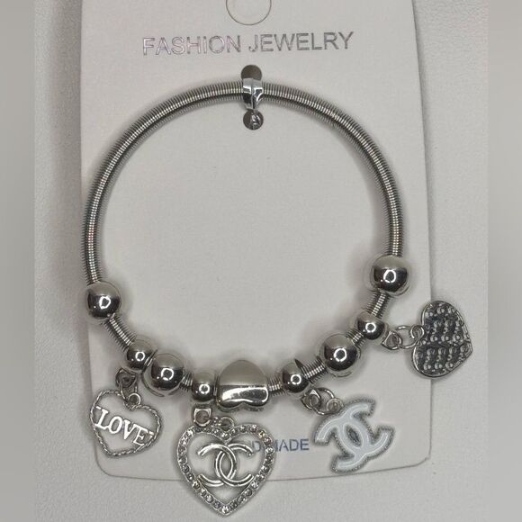 Fashion Jewelry Gold Tone Sparkling Heart
Charm Black charm Stretch Bracelet - Picture 4 of 5